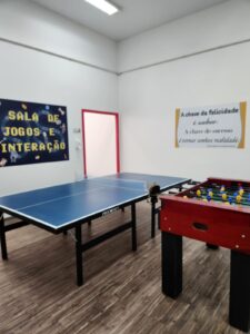 Sala de jogos da Escola Place para socialização dos alunos
